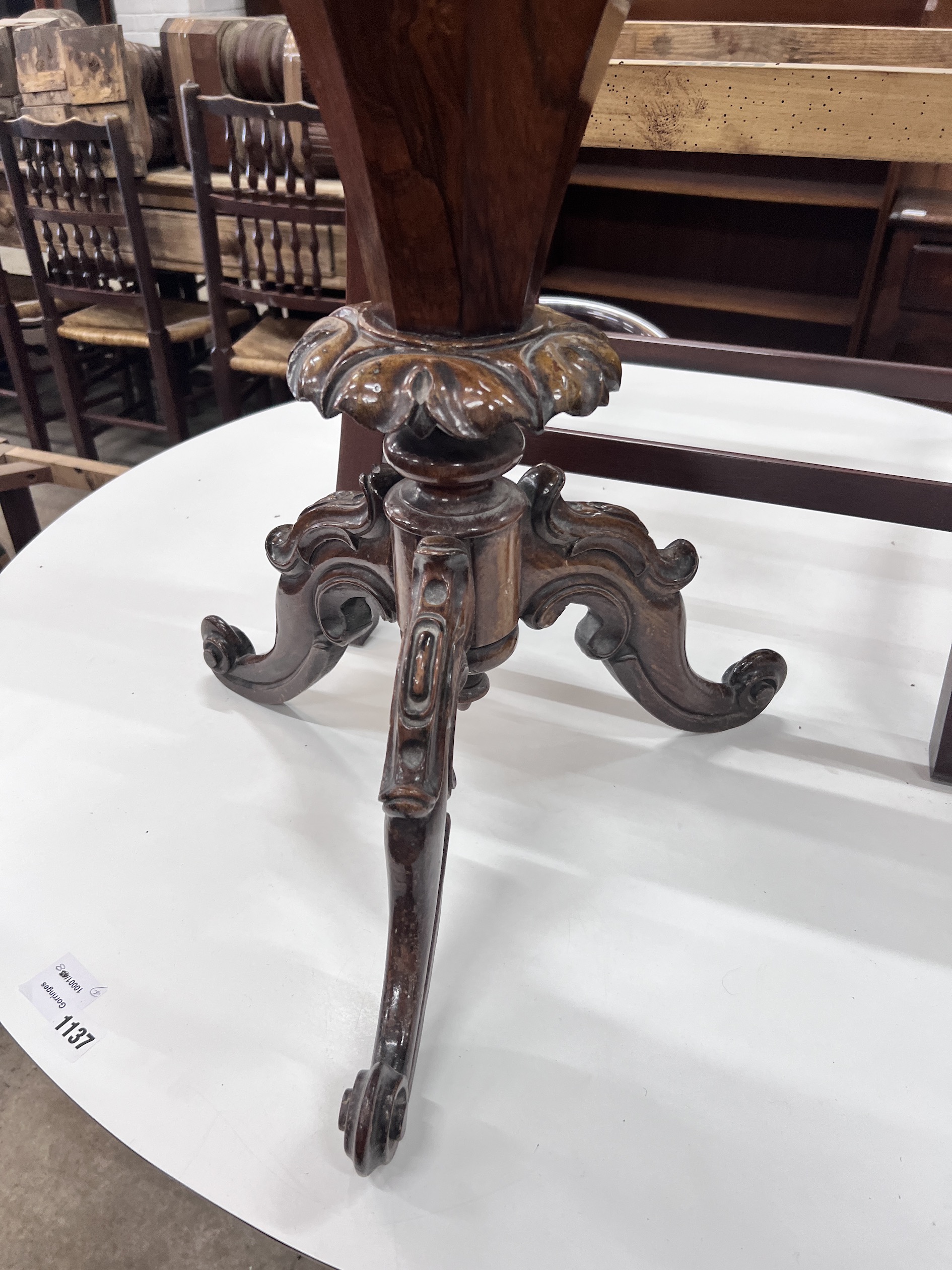 A Victorian octagonal rosewood trumpet work table, width 44cm, height 74cm